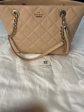 New with tags Genuine Kate Spade Emerson purse pale pink/cream in color